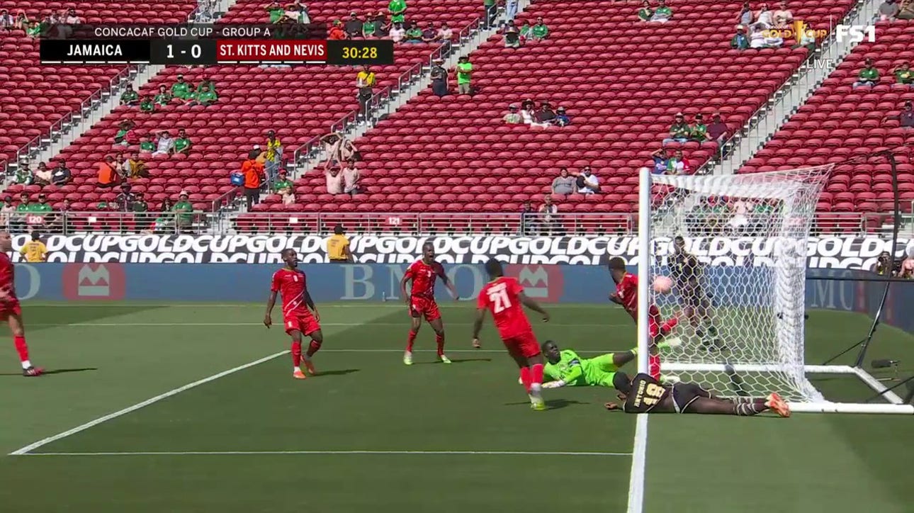 Jamaica takes a 1-0 lead over St. Kitts and Nevis after goalkeeper Julani Archibald scores in own net
