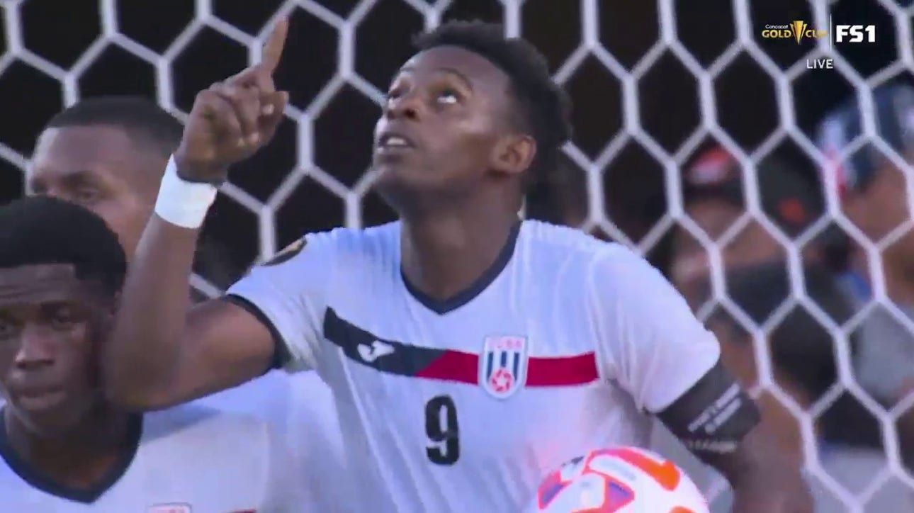 Cuba's Maikel Reyes scores on a PK to trim the deficit against Canada, 4-2