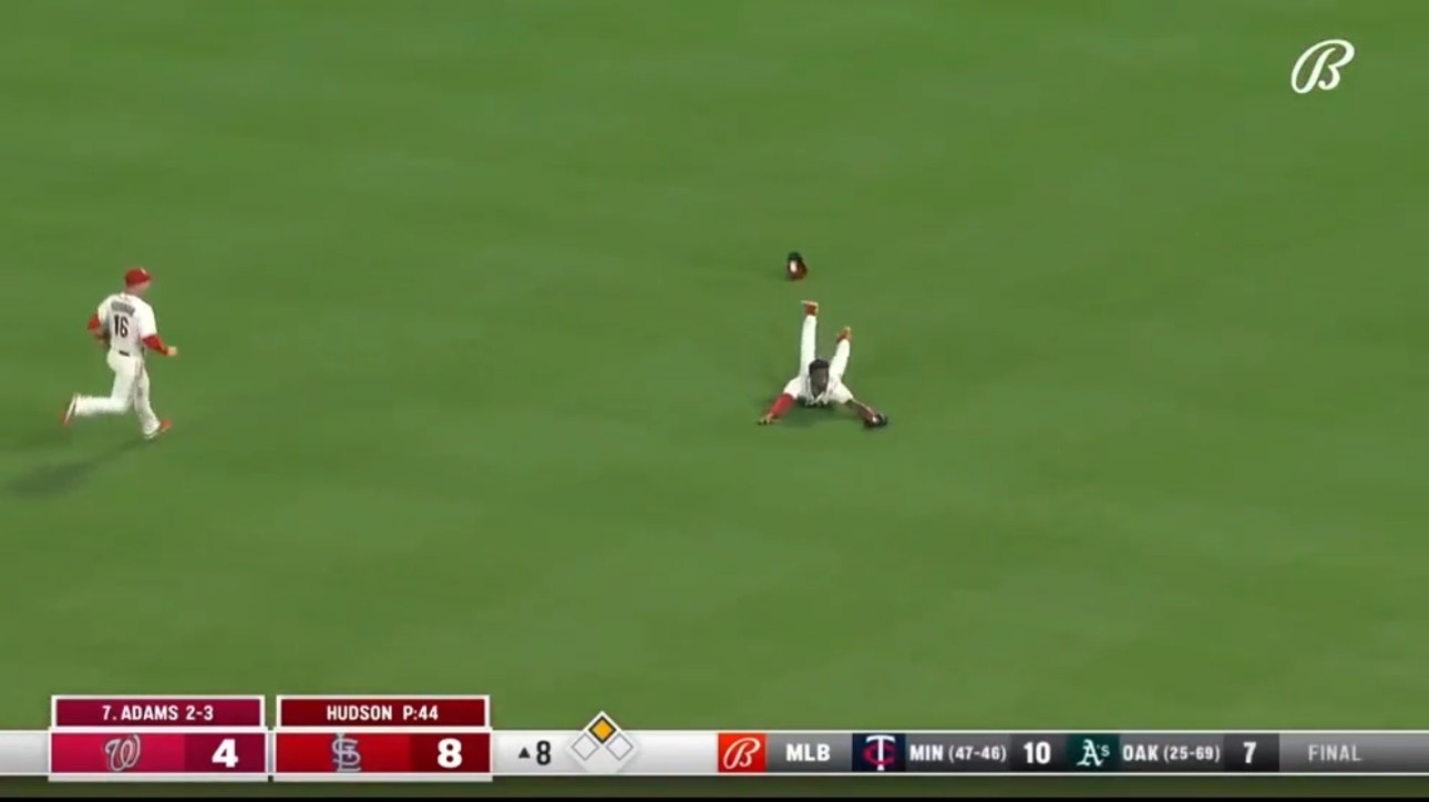 Cardinals' Jordan Walker lays out and makes a diving grab to rob Riley Adams of a base hit