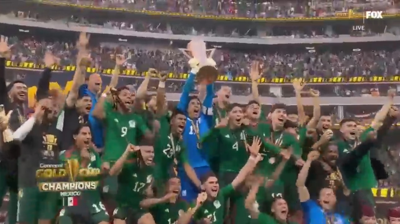 CONCACAF Gold Cup Final Trophy Ceremony: Mexico's Guillermo Ochoa and Santiago Gimenez celebrate by lifting trophy