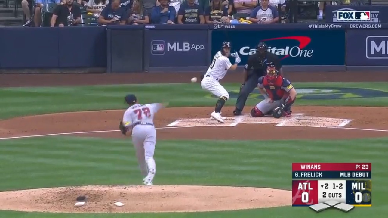Brewers top prospect Sal Frelick hits a single against the Braves in his first major-league at-bat