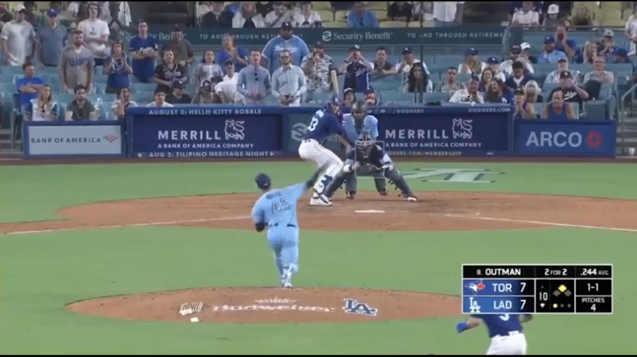 Dodgers' James Outman slams a double to cap a four-run comeback and seal an extra-innings win over the Blue Jays