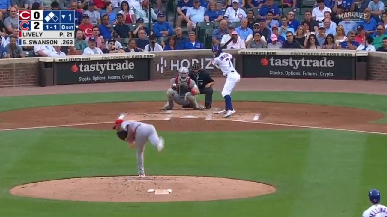 Dansby Swanson knocks a three-run home run, extending the Cubs' lead over the Reds