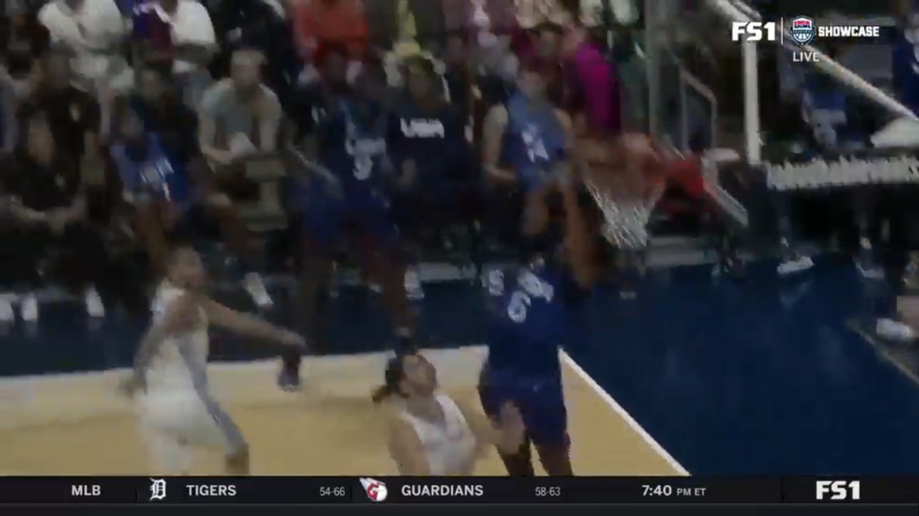 Cam Johnson drives baseline and throws down the reverse jam, extending Team USA's lead vs. Greece