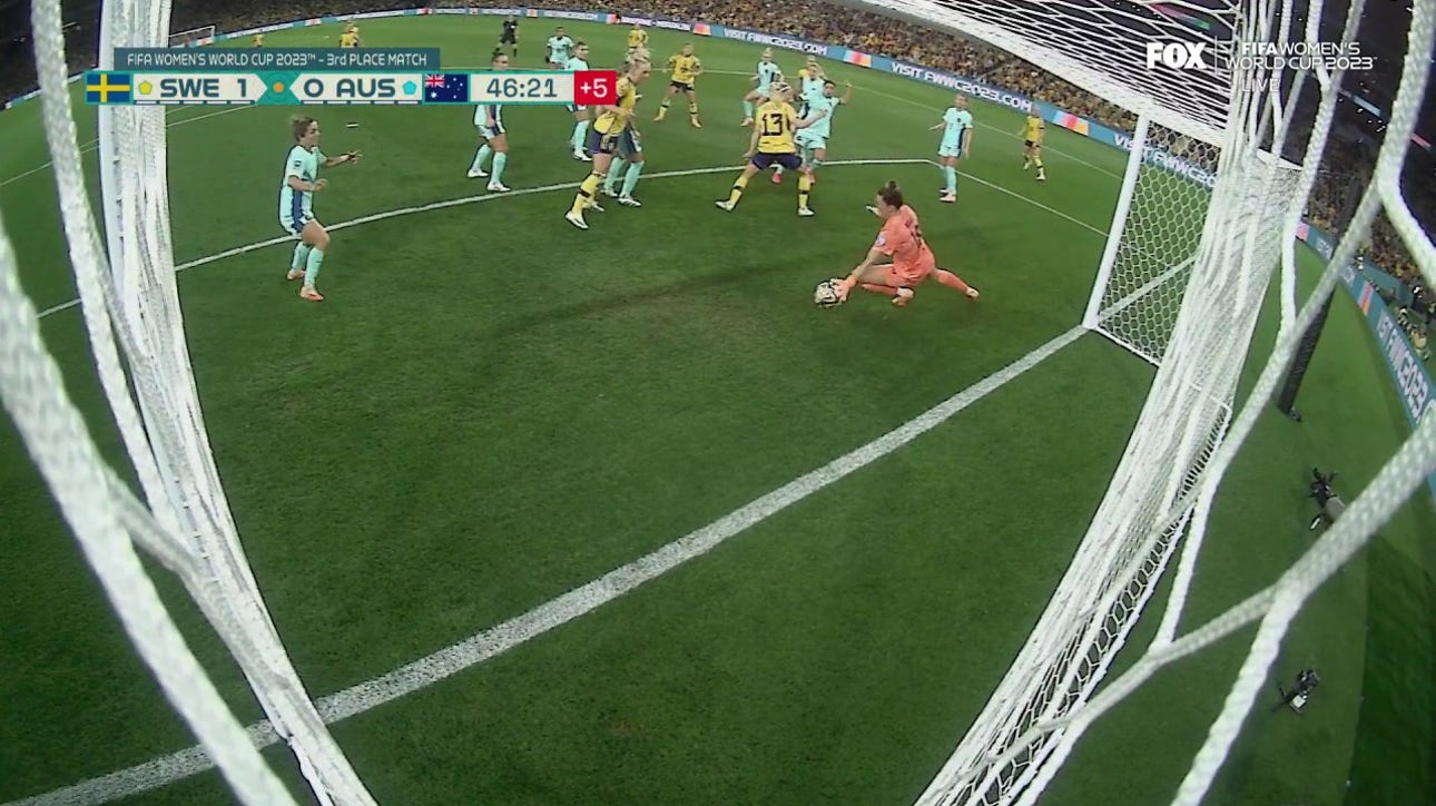 Australia's Mackenzie Arnold makes a great save to keep Sweden's lead at 1-0