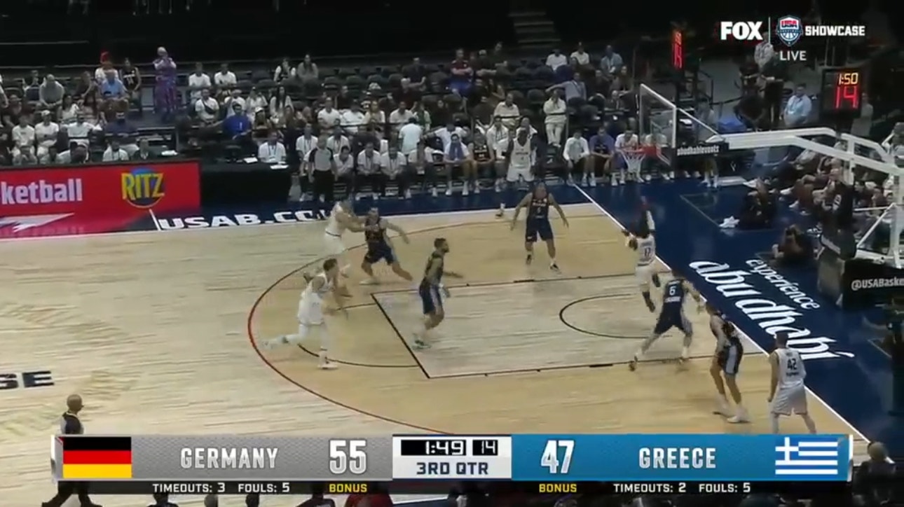 Dennis Schröder drives inside for the layup plus the foul, extending Germany's lead vs. Greece