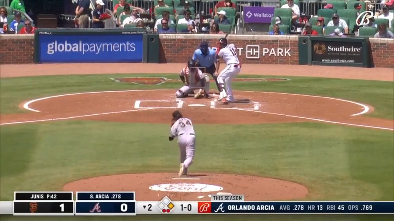 Braves' Orlando Arcia slams a two-run home run against the Giants