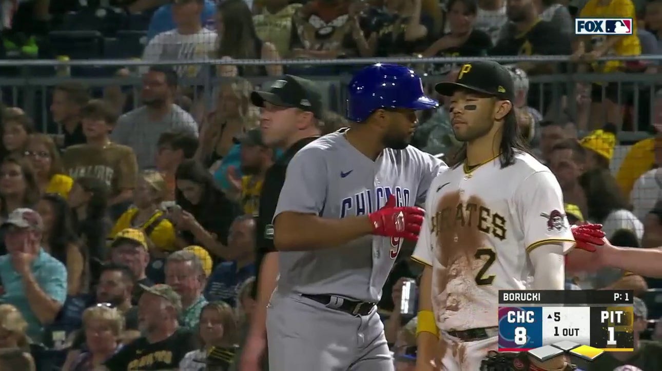 Jeimer Candelario hits an RBI single to extend the Cubs' substantial lead against the Pirates