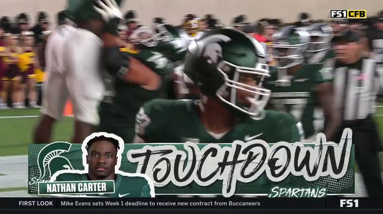 Michigan State's Nathan Carter responds with a 3-yard touchdown to regain the lead vs. Central Michigan