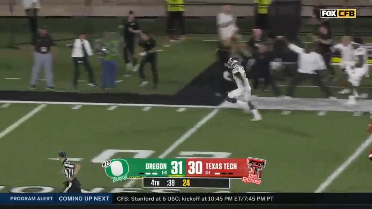 Jeffrey Bassa intercepts Tyler Shough's pass and runs it in to secure Oregon's 38-30 win over Texas Tech