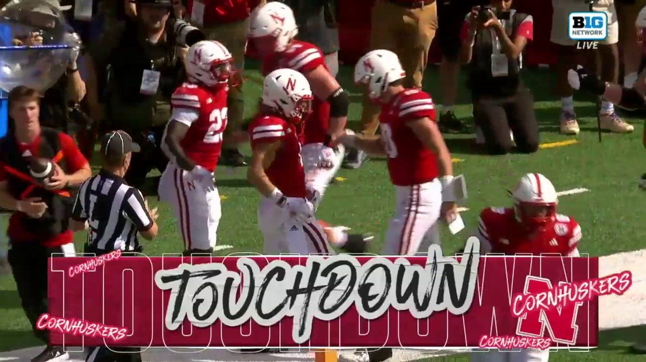 Billy Kemp rushes for a nine-yard touchdown to give Nebraska a lead over Louisiana Tech