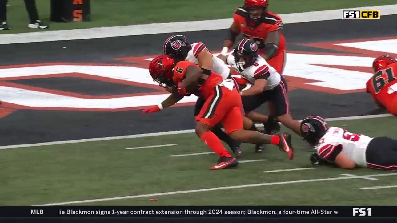 Damien Martinez punches it in for a four-yard touchdown to give Oregon State the lead over Utah