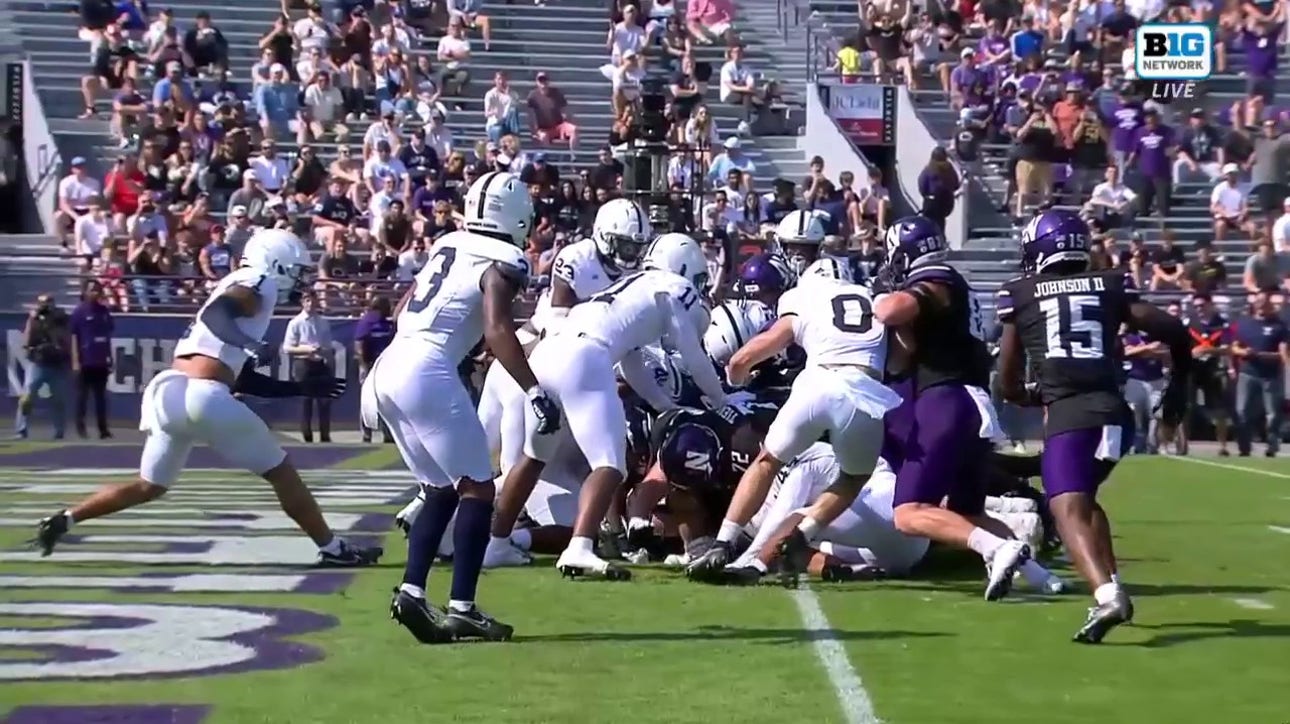 Ben Bryant punches in a one-yard touchdown to give Northwestern a lead over Penn State