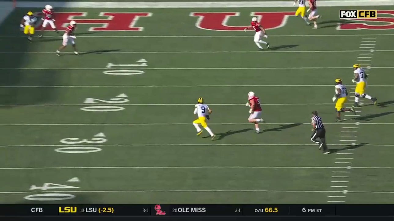 Michigan's J.J. McCarthy shows off ELITE elusiveness in WILD 16-yard passing TD against Nebraska