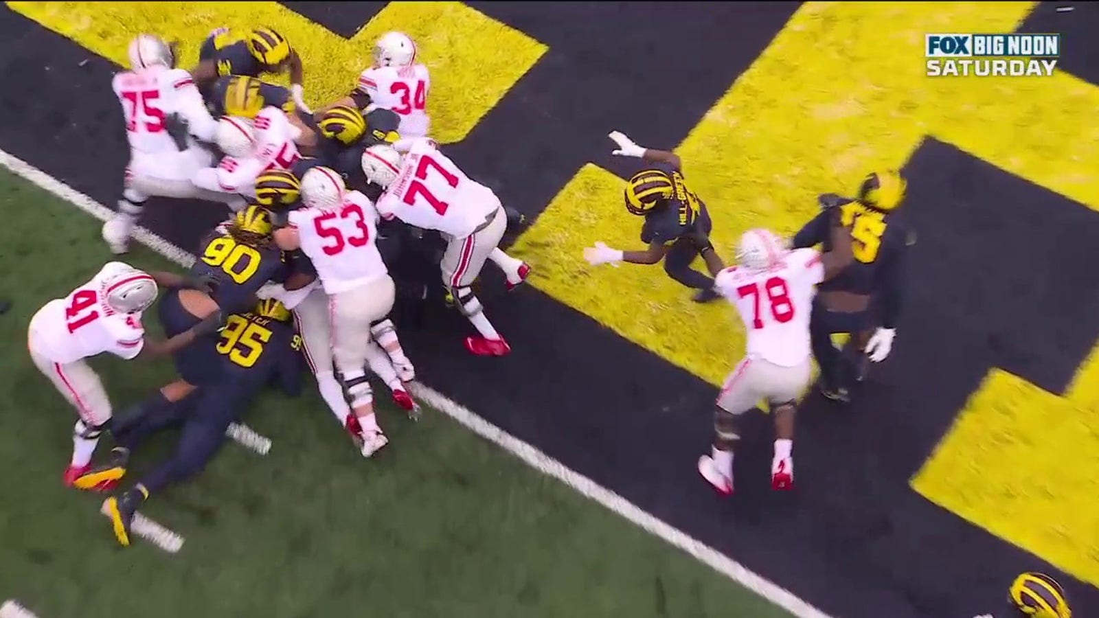 TreVeyon Henderson punches it in to cut Michigan lead to 28-20