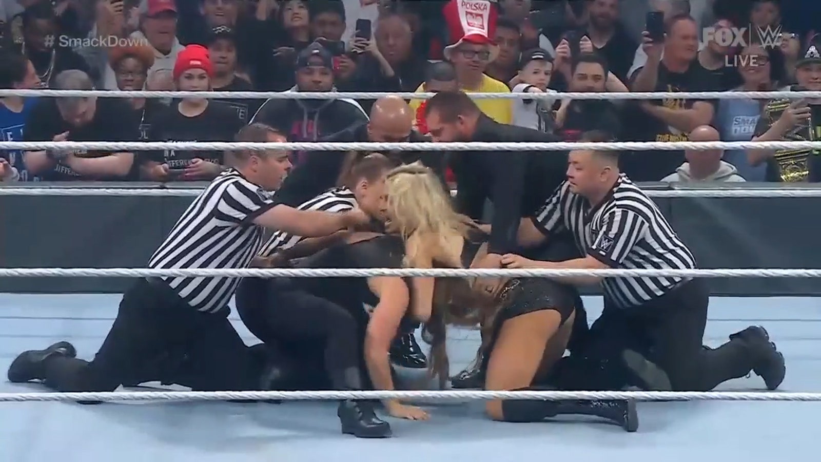 Ronda Rousey and Charlotte Flair separated by officials multiple times after violent attack I WWE on FOX