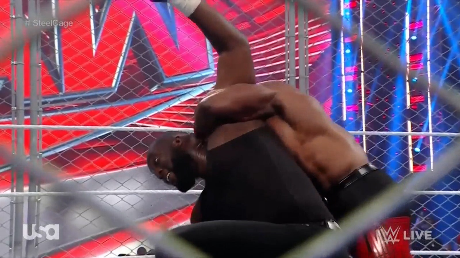 Bobby Lashley and Omos locked in a steel cage on Monday Night Raw I WWE on FOX