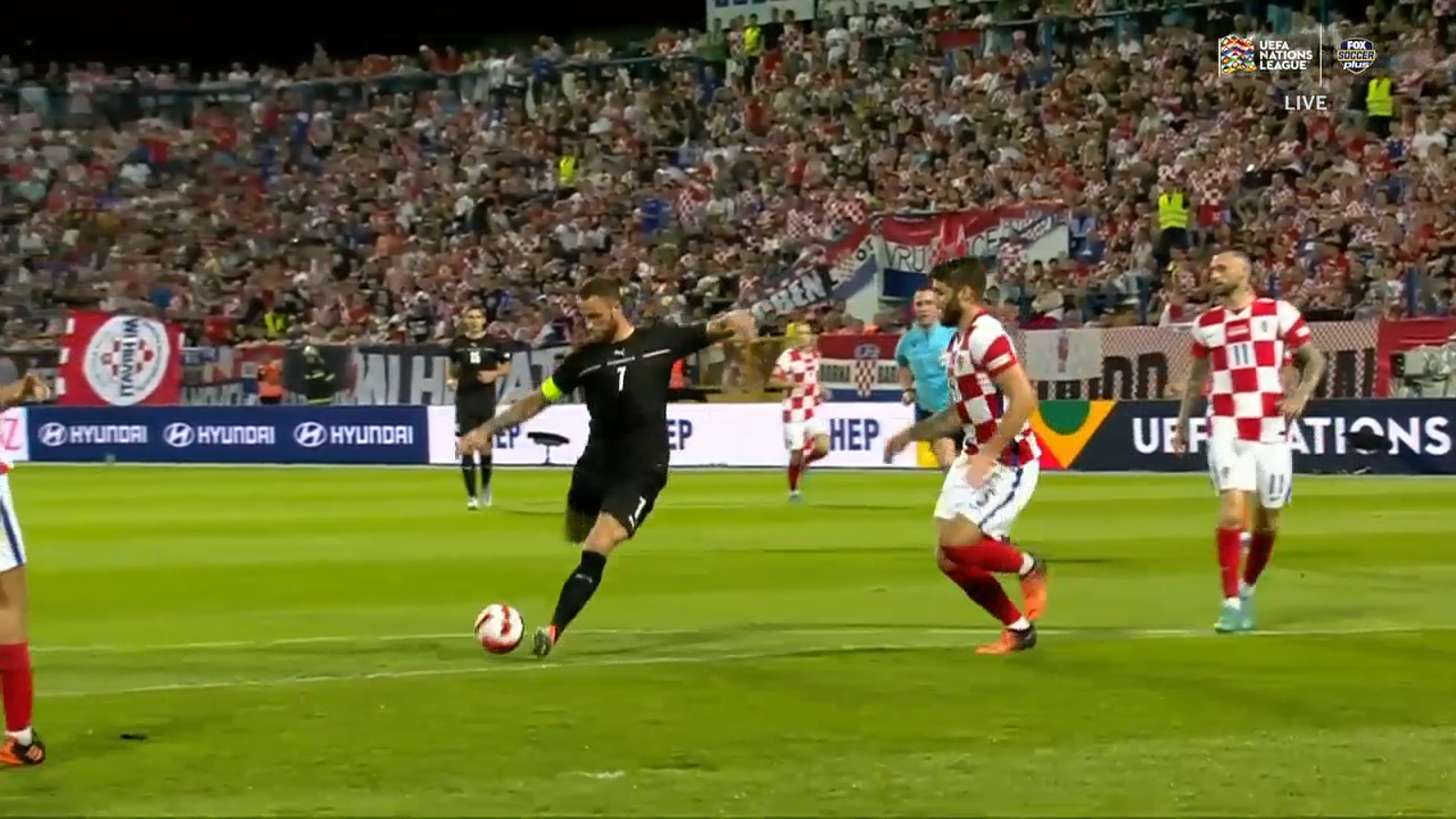 Marko Arnautovic weaves past defenders to give Austria a 1-0 lead