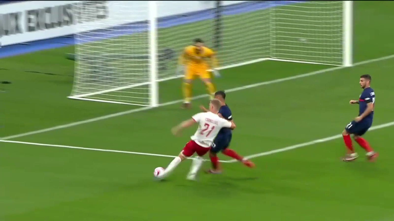 Andreas Cornelius converts from a tough angle to push Denmark ahead