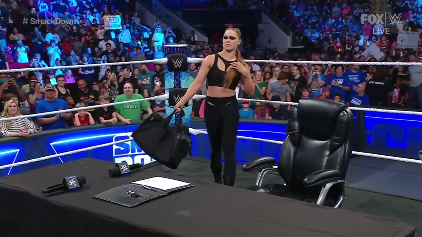 Ronda Rousey crashes SmackDown with cold hard cash