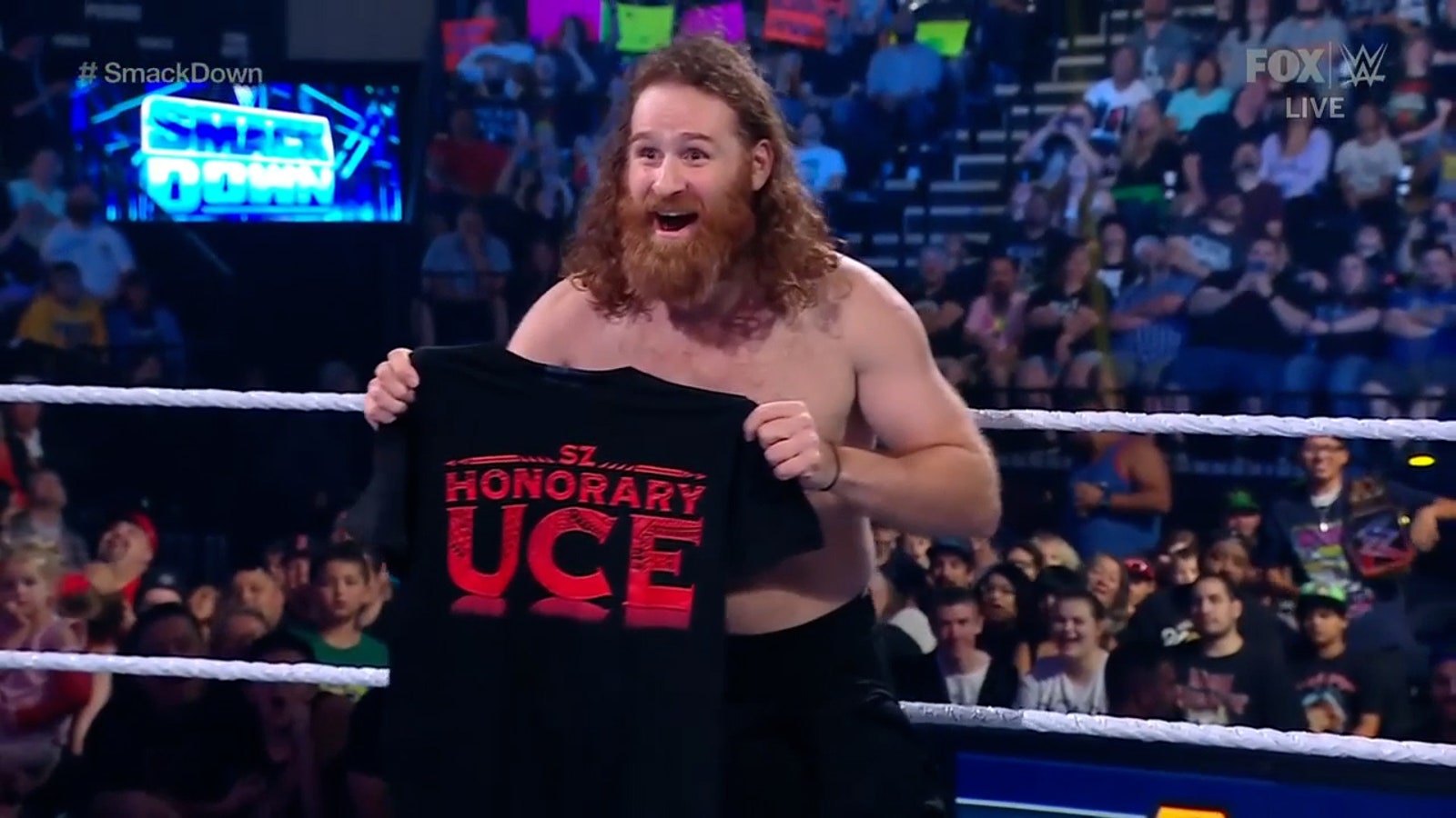 Roman Reigns presents Sami Zayn with his very own Bloodline shirt on SmackDown 