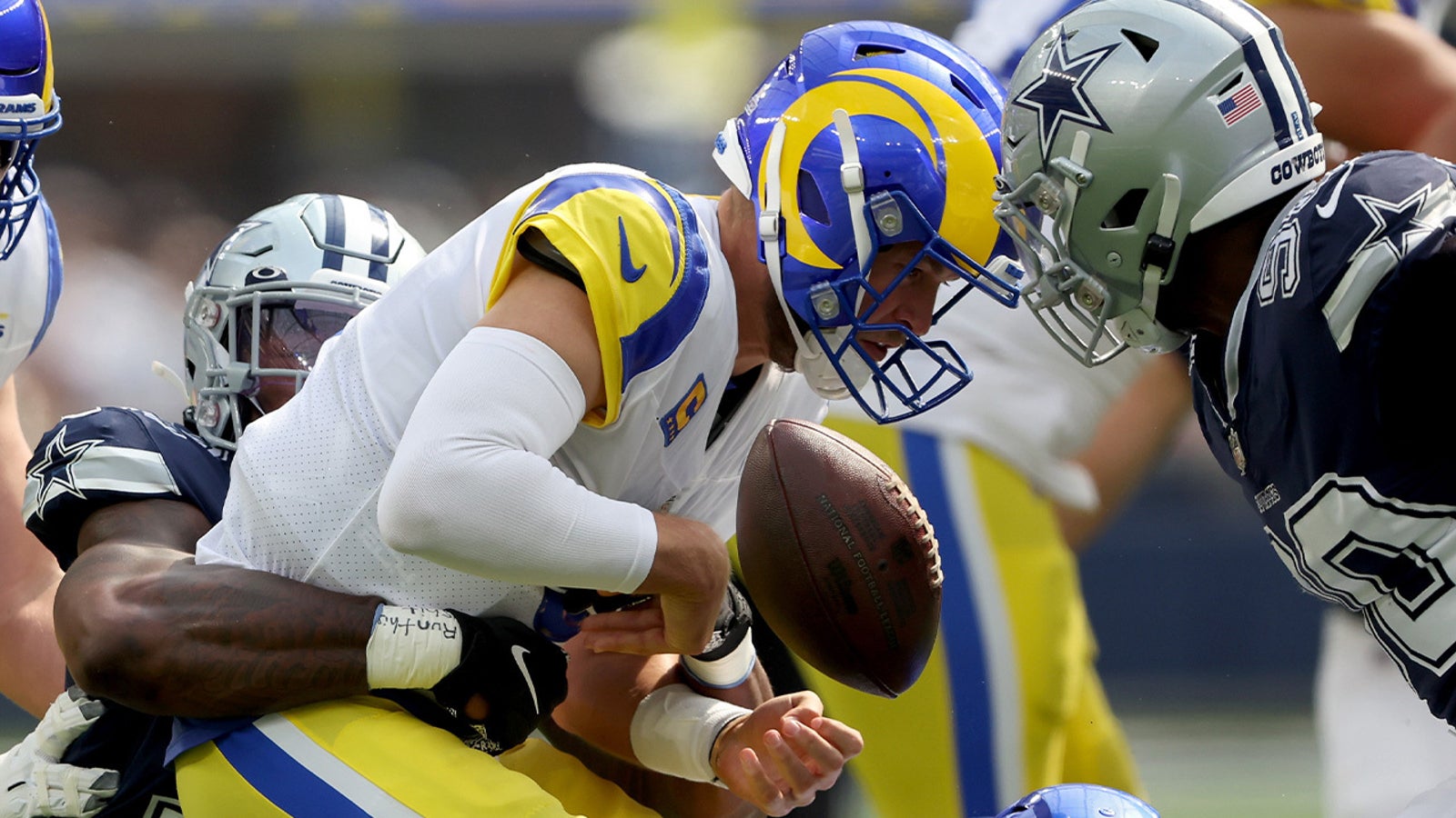 Cowboys defense overwhelms Rams