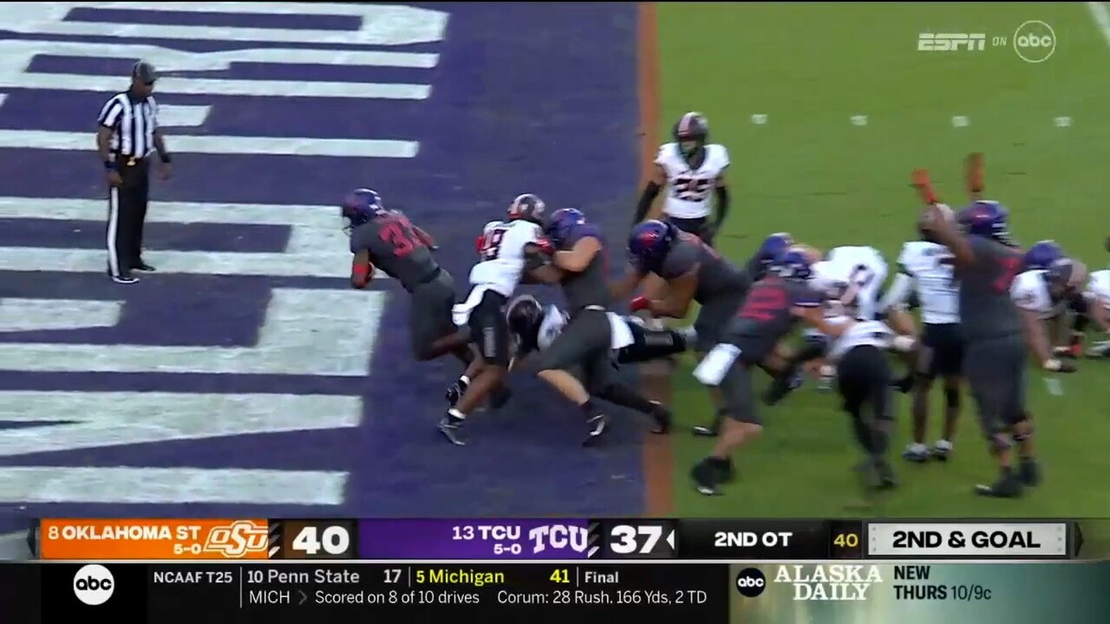 TCU's Kendre Miller scores the two-yard TD to upset OSU in overtime 43-40