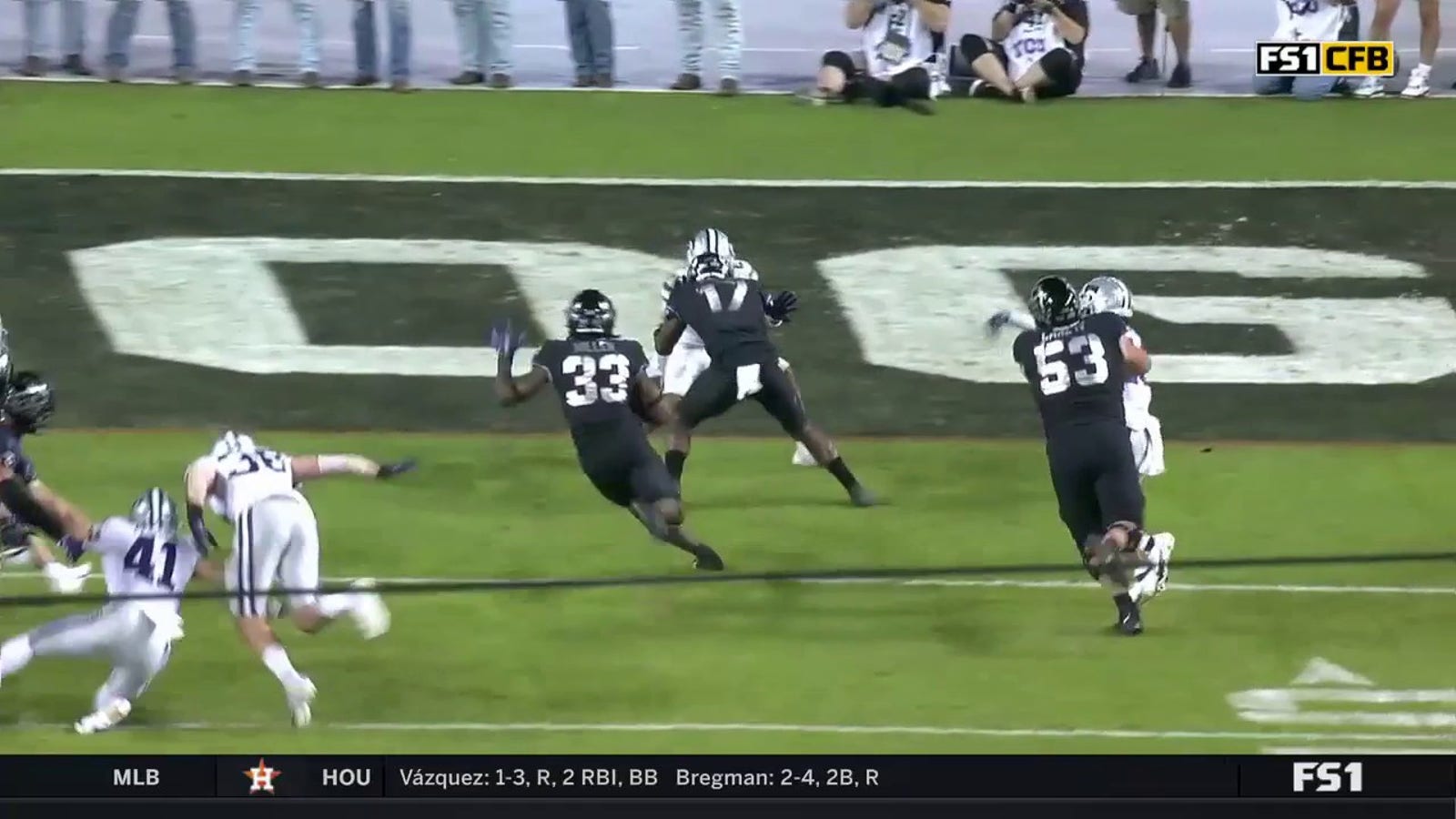 Kendre Miller bullies his way past Kansas State's defense.