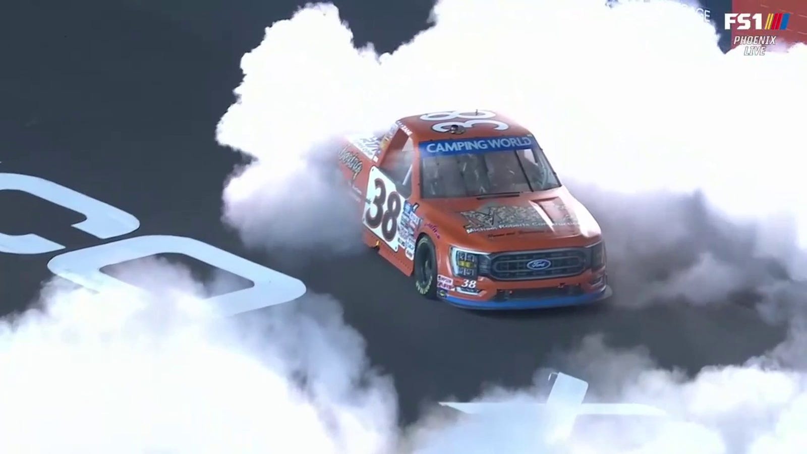 Zane Smith win the 2022 NASCAR Camping World Truck Series Championship after holding off Ben Rhodes in wild final overtime finish.