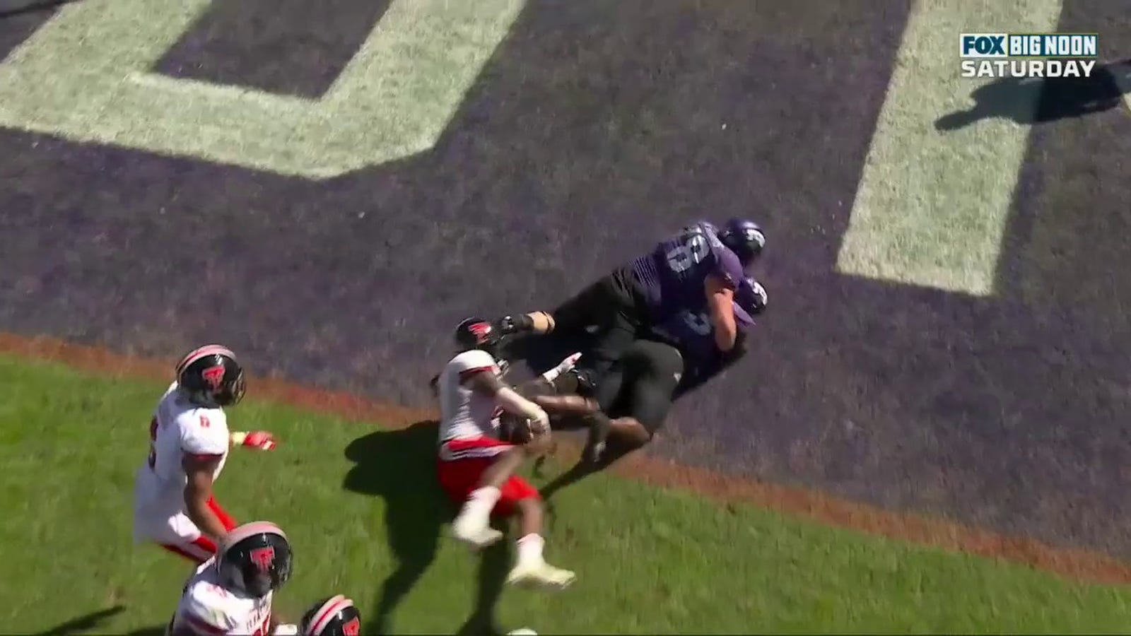 Kendre Miller finds a hole in the Texas Tech defense and runs it in