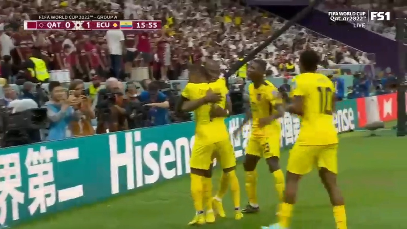 Ecuador's Ener Valencia is fouled in the box and scores a PK against Qatar. 