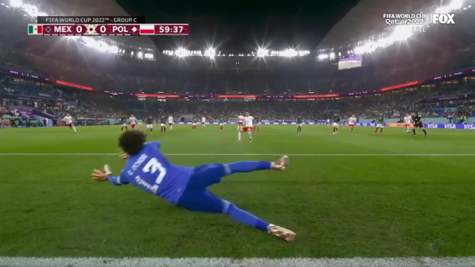 Mexico's Guillermo Ochoa saves a PK from Robert Lewandowski in the 57th minute against Poland