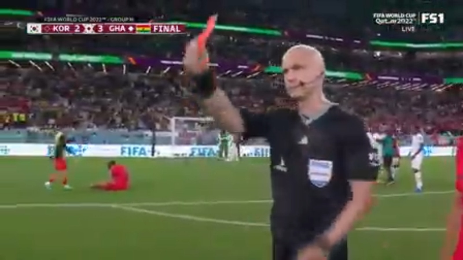 South Korea head coach Paulo Bento shows a red card after 3-2 loss to Ghana