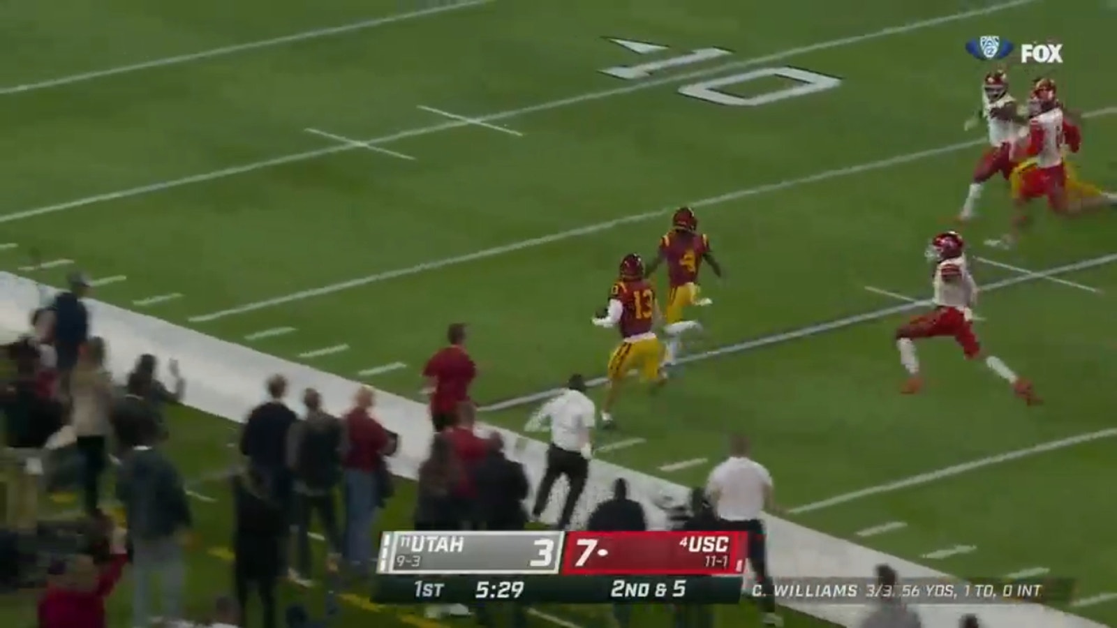 USC's Caleb Williams escapes pressure and breaks off a 59-yard run