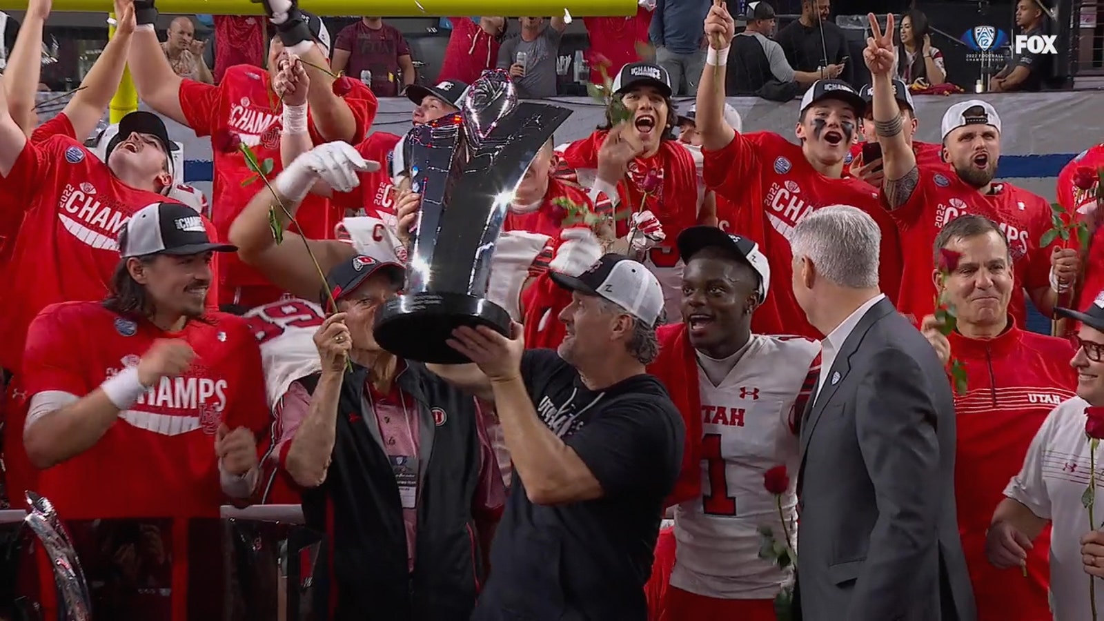 No. 11 Utah hoists the Pac-12 trophy after upsetting No. 4 USC