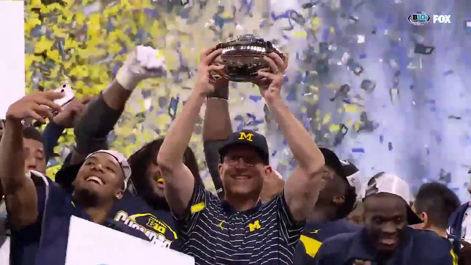 No. 2 Michigan hoists the Big Ten trophy