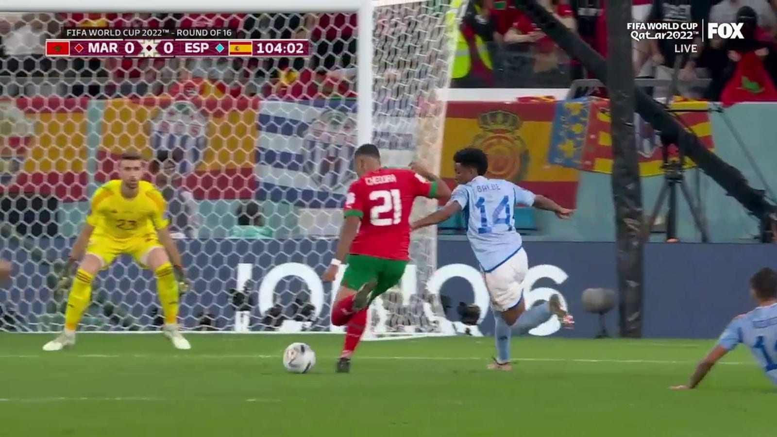 Walid Cheddira's shot for Morocco saved by Spain's goalkeeper Unai Simon