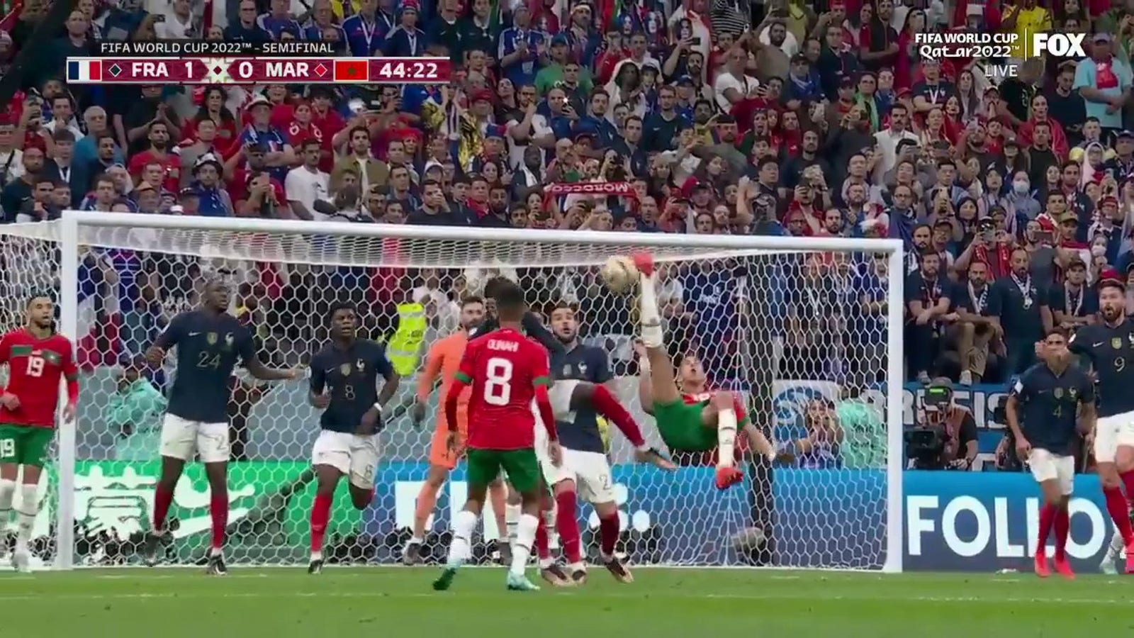 Moroccan Jawad El Yamiq's bicycle kick ALMOST goes in but Frenchman Hugo Lloris denies it