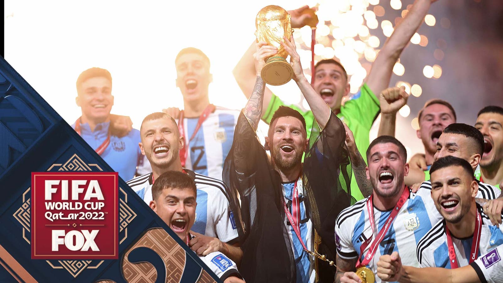 Lionel Messi hoists trophy after Argentina wins the 2022 FIFA World Cup 