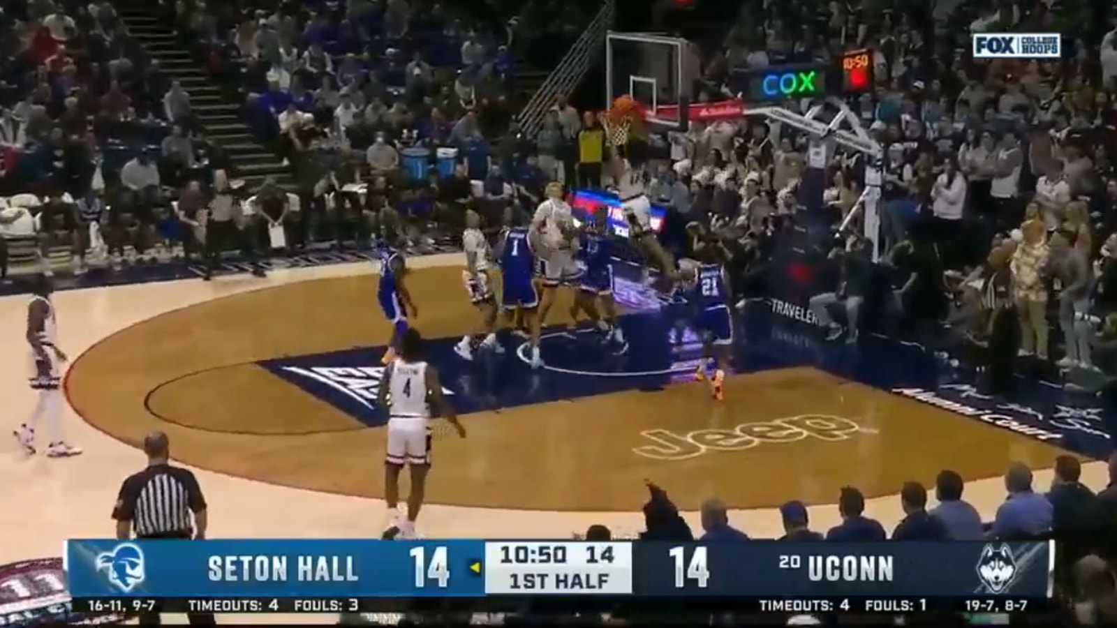 Andre Jackson Jr. throws it down after a perfect alley-oop from Jordan Hawkins to give UConn the early lead