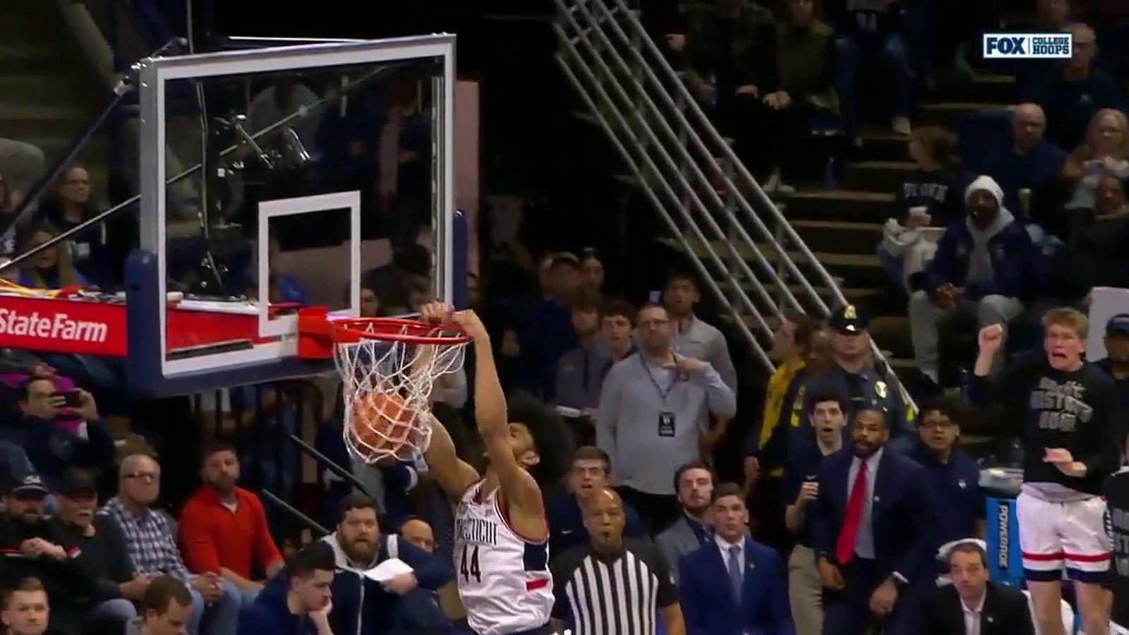 Andre Jackson Jr. takes flight to throw down a two-handed jam to extend UConn's lead over Seton Hall