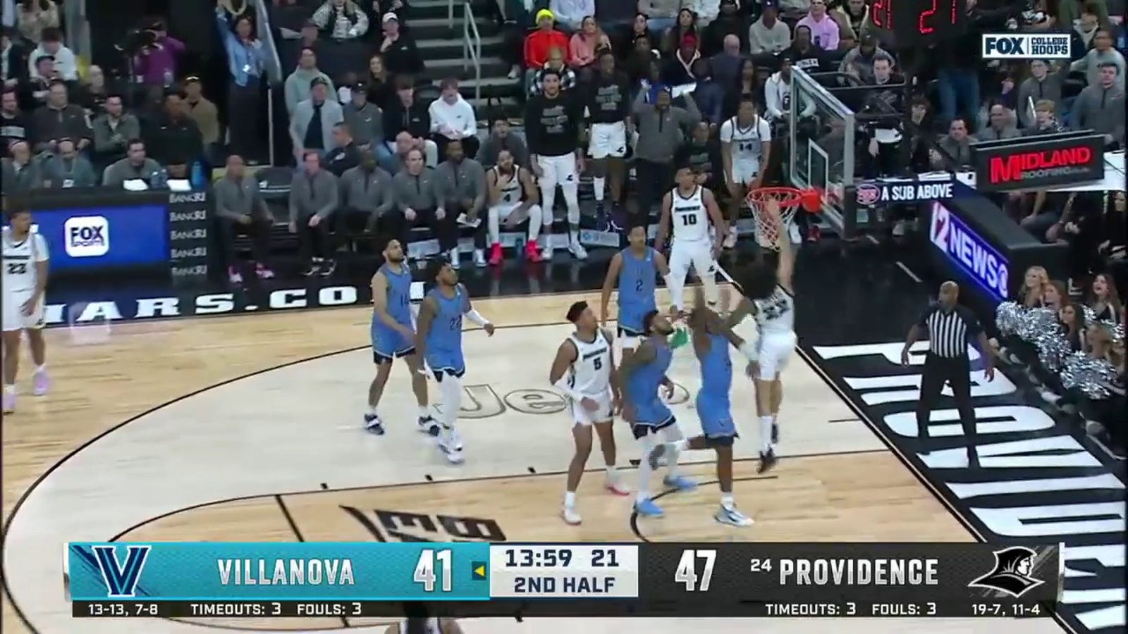 Devin Carter throws down a one-handed jam to extend Providence's lead over Villanova
