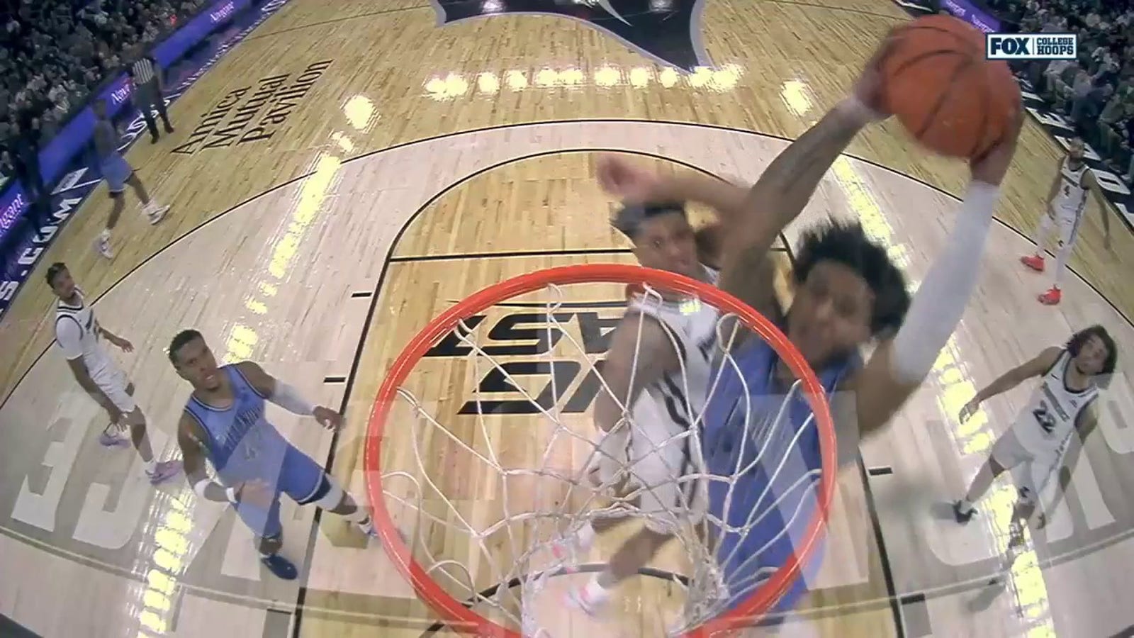 Cam Whitmore hammers in a two-handed slam against Providence, as Villanova trims the lead