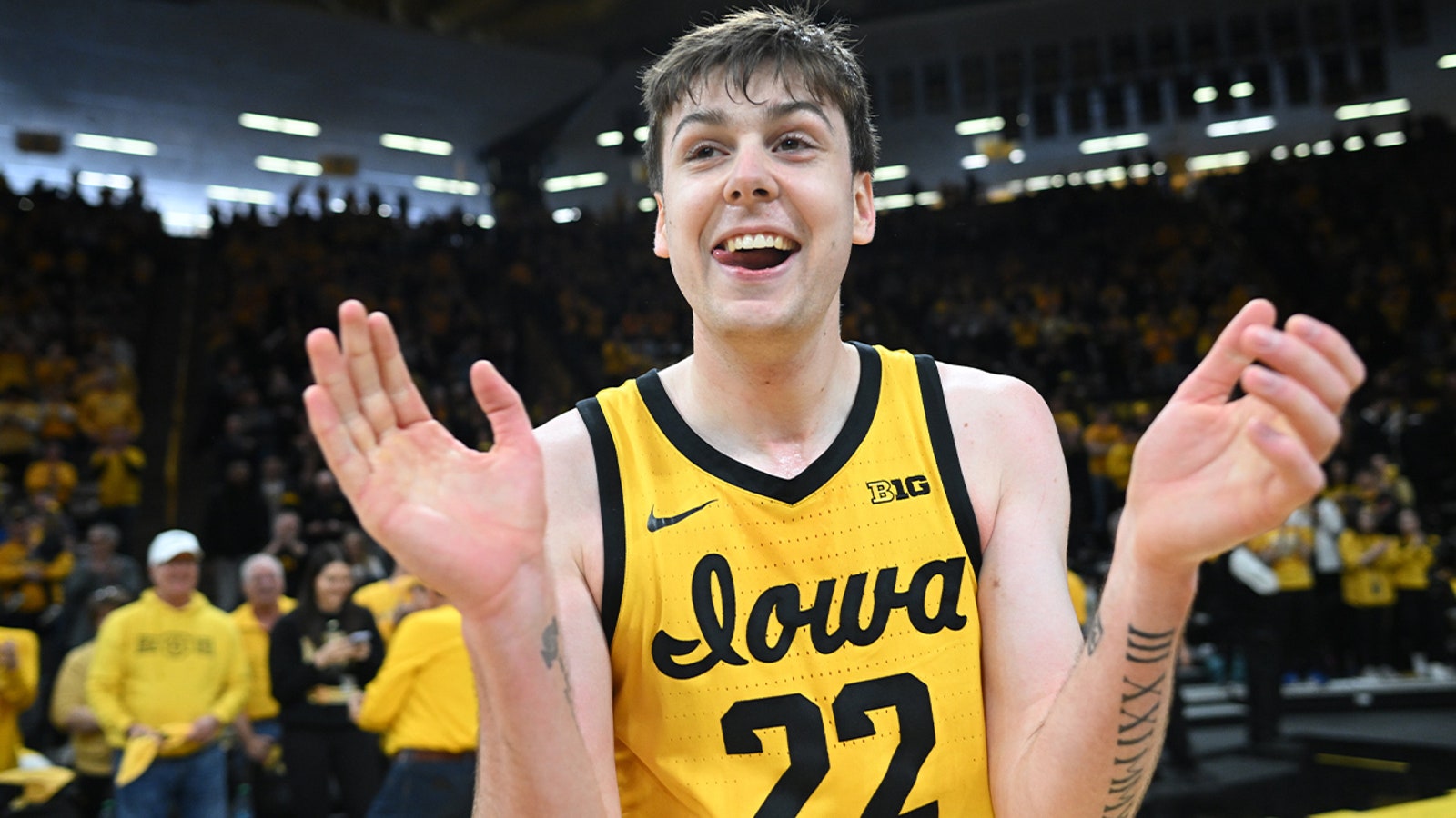 Iowa scores 23 in final 90 seconds to force OT