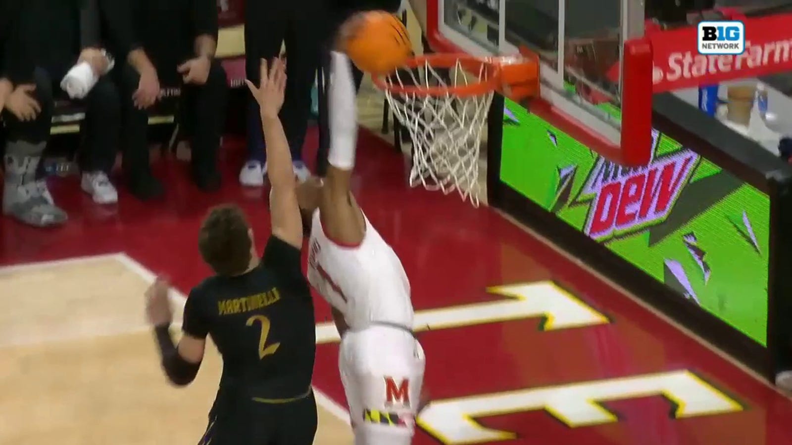 Maryland's Jahmir Young throws down a one-handed dunk vs. Northwestern