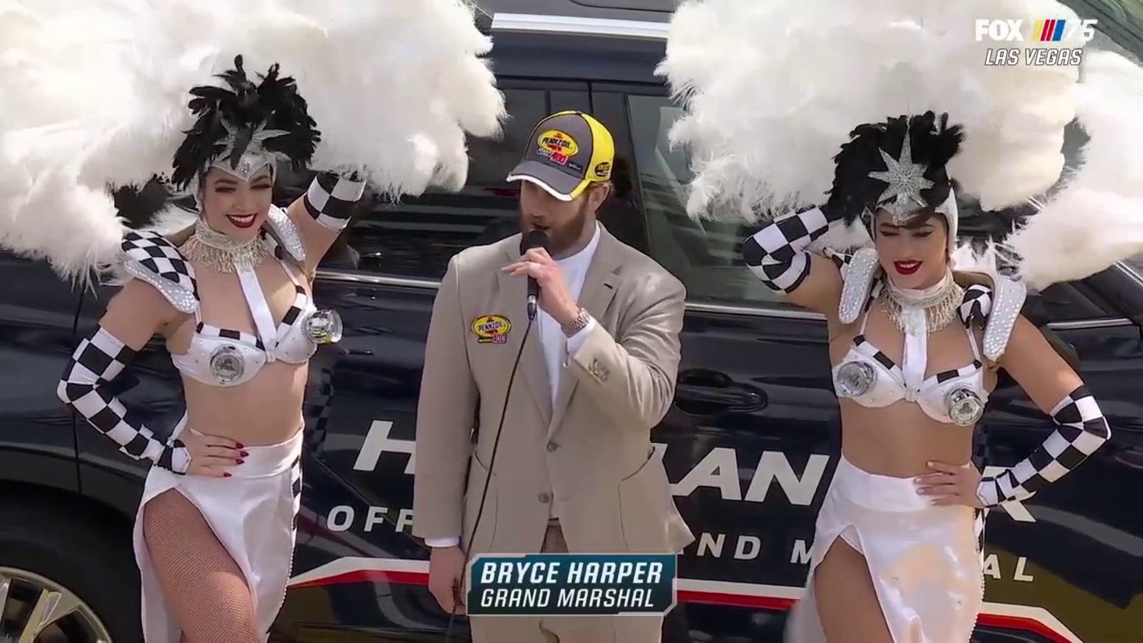Bryce Harper tells drivers to start their engines at the Pennzoil 400