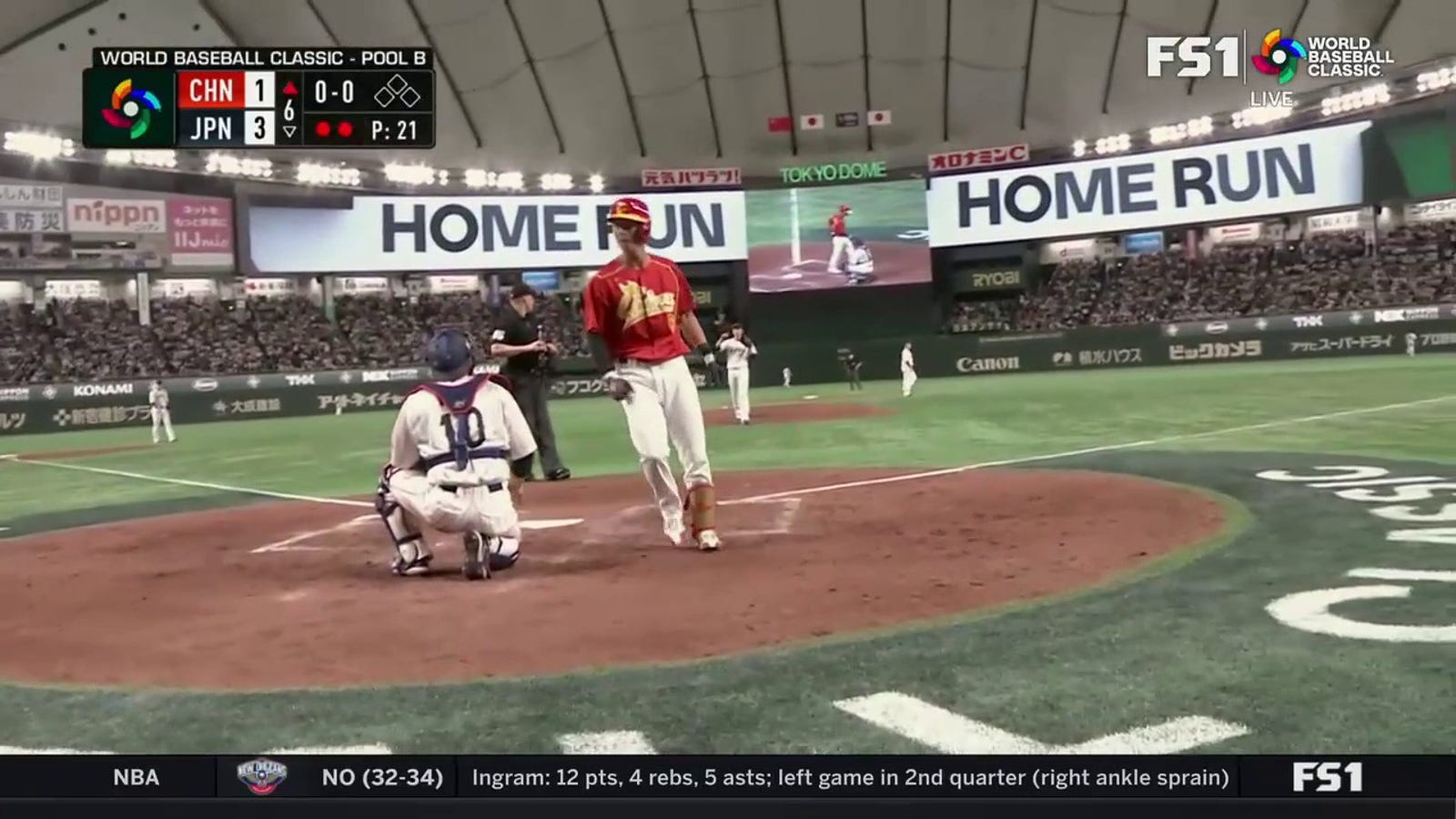 Pei Liang cranks a solo home run to get China on the board against Japan, 3-1