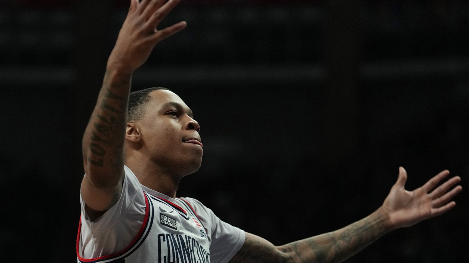UConn's Jordan Hawkins scores 19 points in a 77-63 win over Providence.