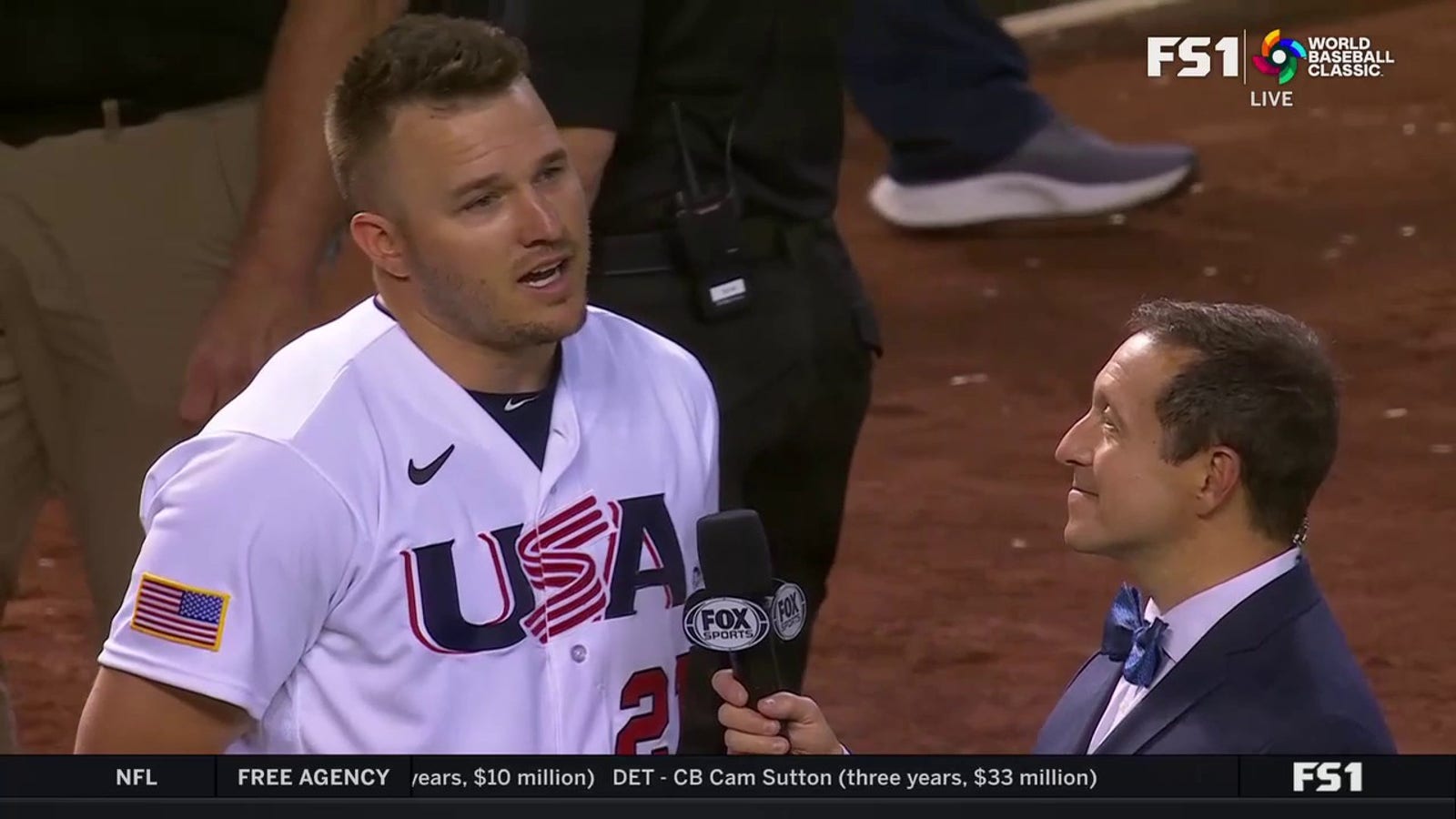 Mike Trout talks to Ken Rosenthal after the USA defeats Canada 12-1
