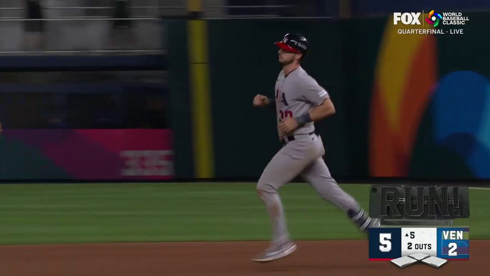 Kyle Tucker hit a solo home run to the right giving the US a 5-2 lead over Venezuela